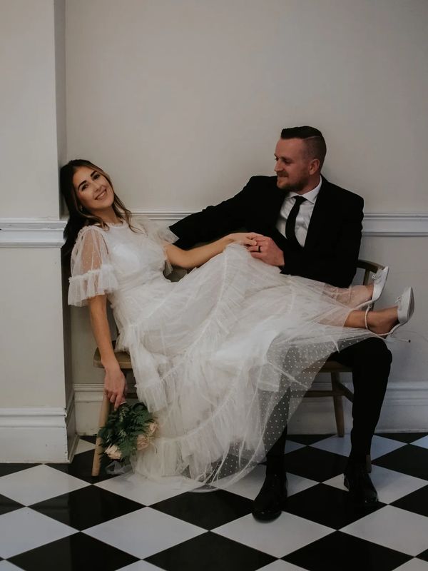 Bride and groom portrait in the stairwell at Vaux