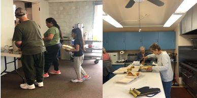 a group of people standing around a kitchen preparing food