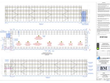 Detailed construction drawing with grid lines and notes for a structural project.