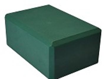 A green rectangular foam block.
