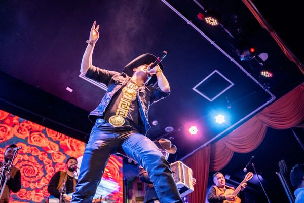 Energetic lead singer with microphone