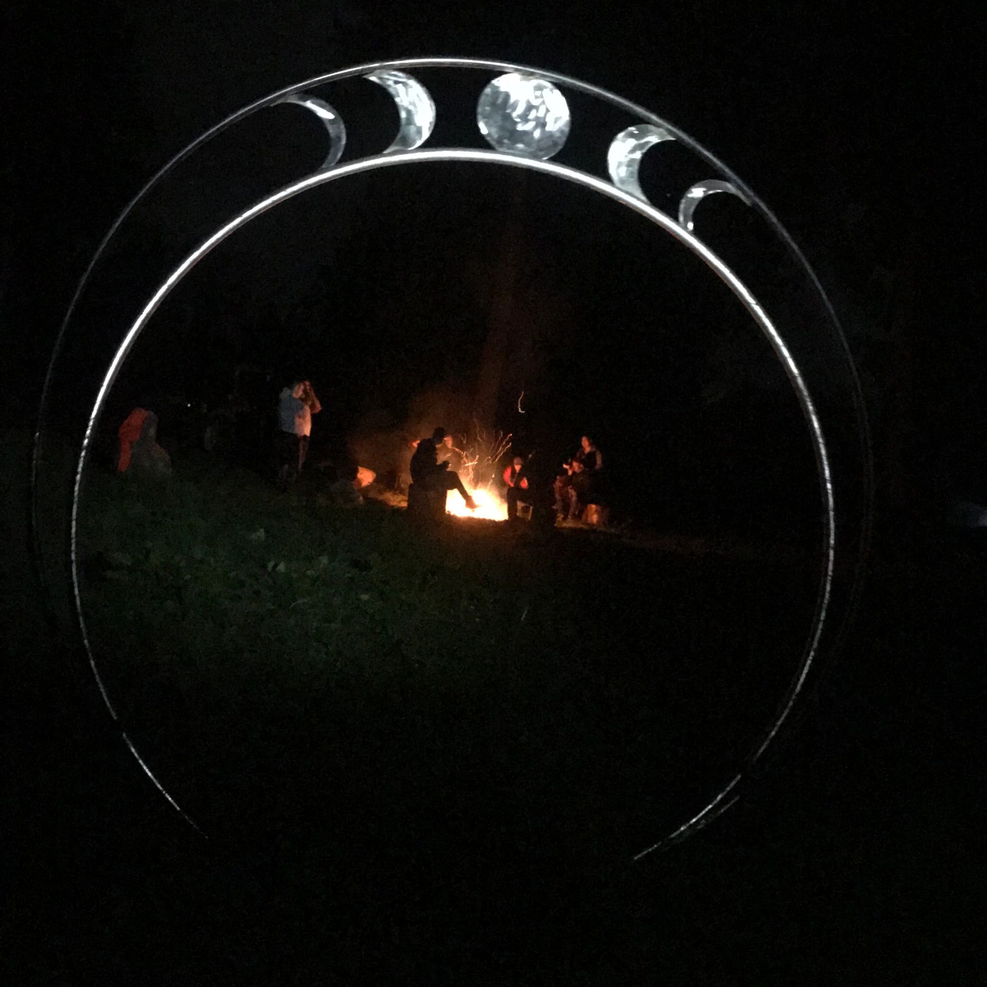 A beautiful welded steel circular portal serves as a gateway to our event venue at Misty Clover Farm