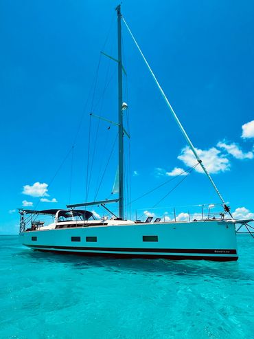 Saying hi to some friends in their Beneteau 55' Oceanis anchored off of Highborne Cay, Exumas, Baham
