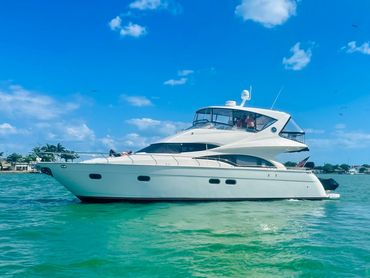 Tending to a client in his Marquis 59' while in Key West, FL.