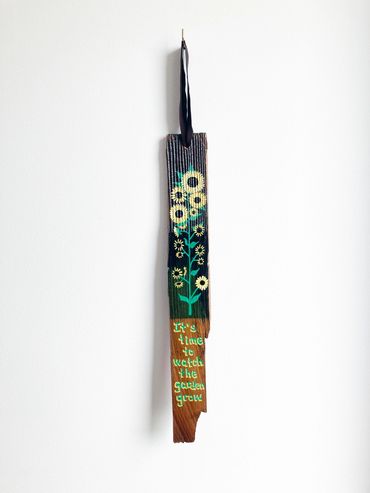 sunflowers painted on an existential plank handlettered It's time to watch the garden grow