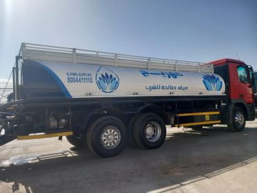 Water tanker truck for potable water delivery.