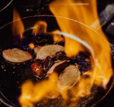 In House Smoke Duck Breast Flambayed in Sherry