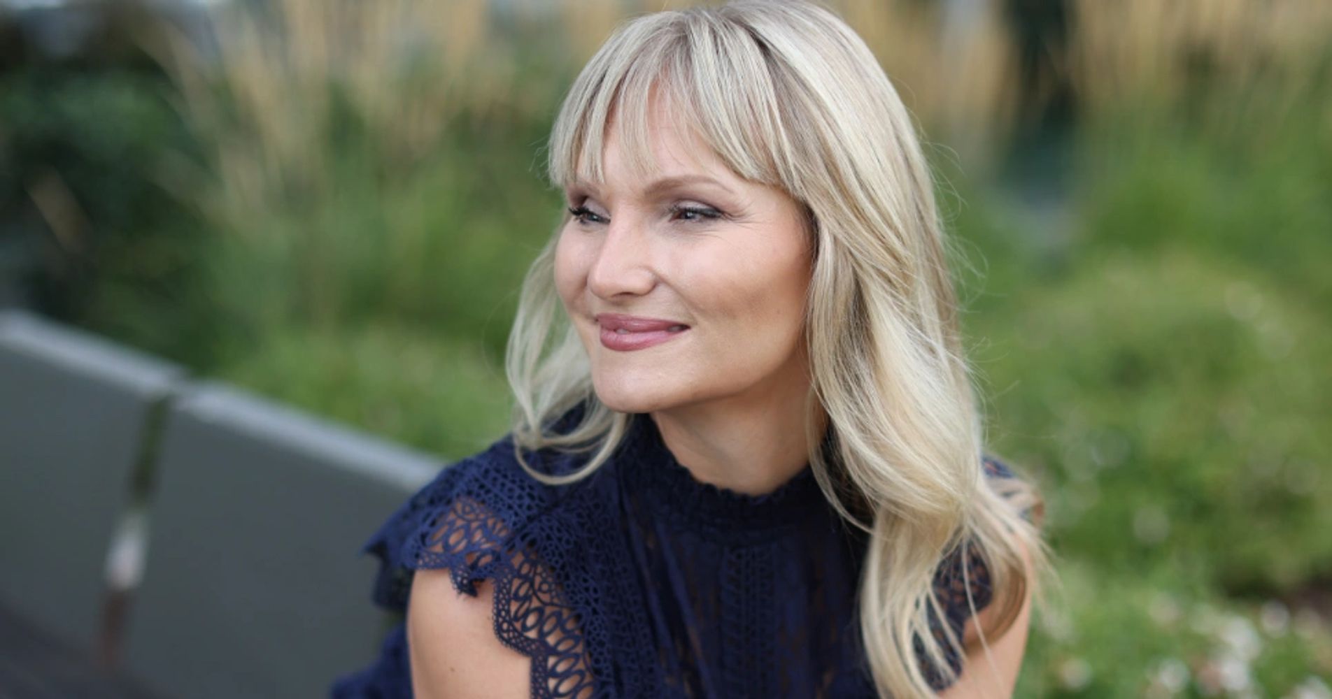 Dr. Julia Myers, speaker and founder of Generational Wisdom, smiling outdoors