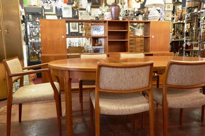 plenty of Vintage Teak dining sets and credenza & furnishings for any home, office, or business