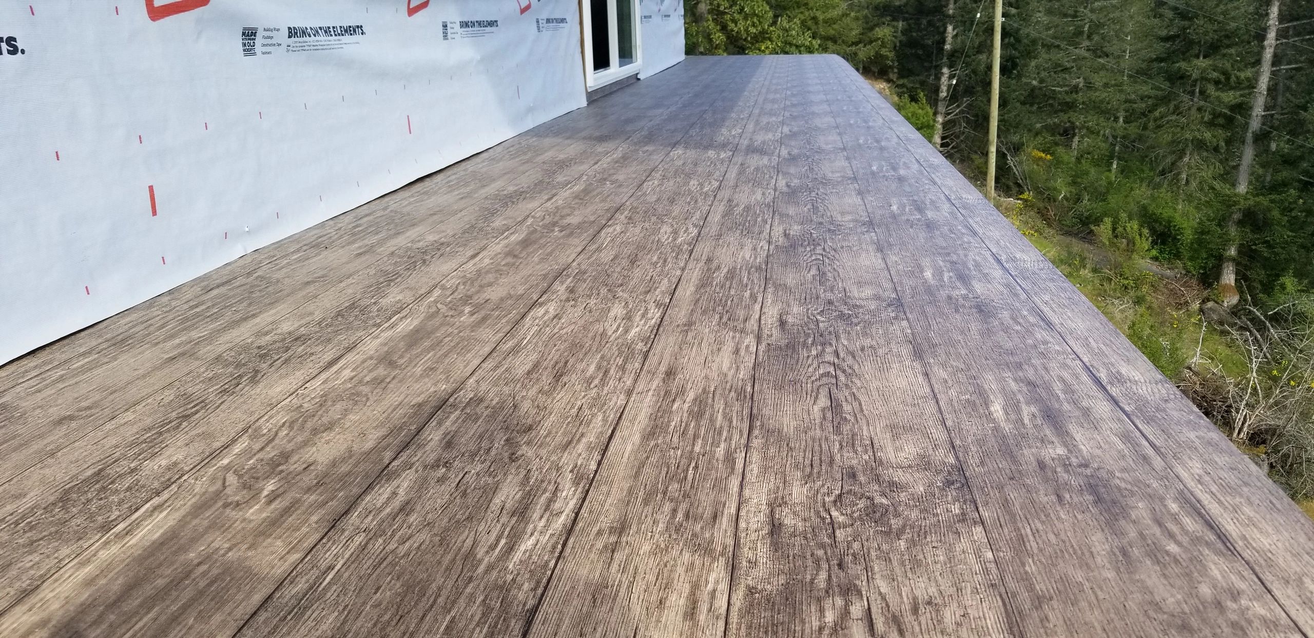 Wood grain vinyl deck