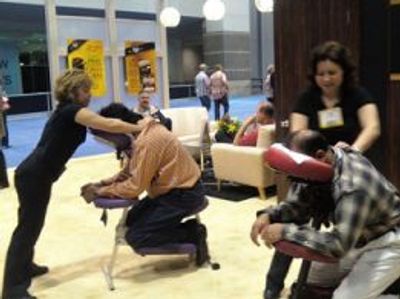Chair Massage is a great incentive to increase trade show traffic to client's booths.