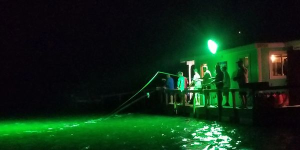 Landcut Floating Cabin night fishing. All-inclusive. Corporate trips. Corpus Christi fishing guide