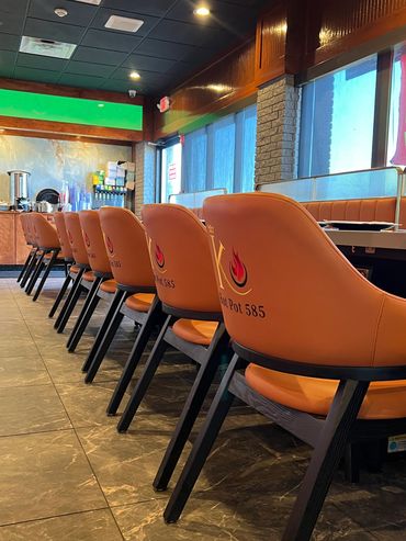 chairs around a hot pot table