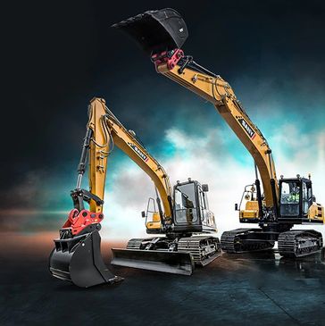 Two yellow excavators with extended arms and buckets.