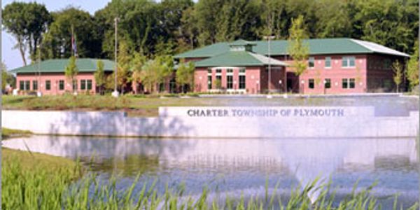 Charter Township of Plymouth building and pond