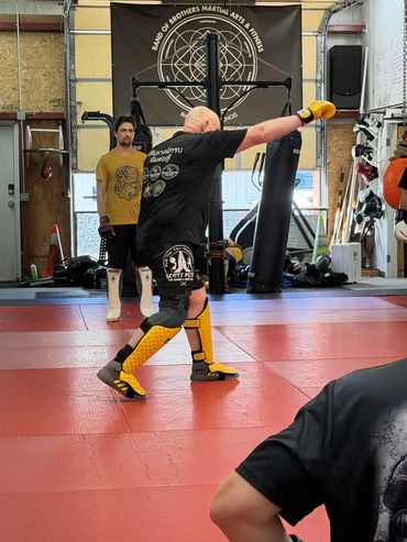 Martial arts training session with focused participants.