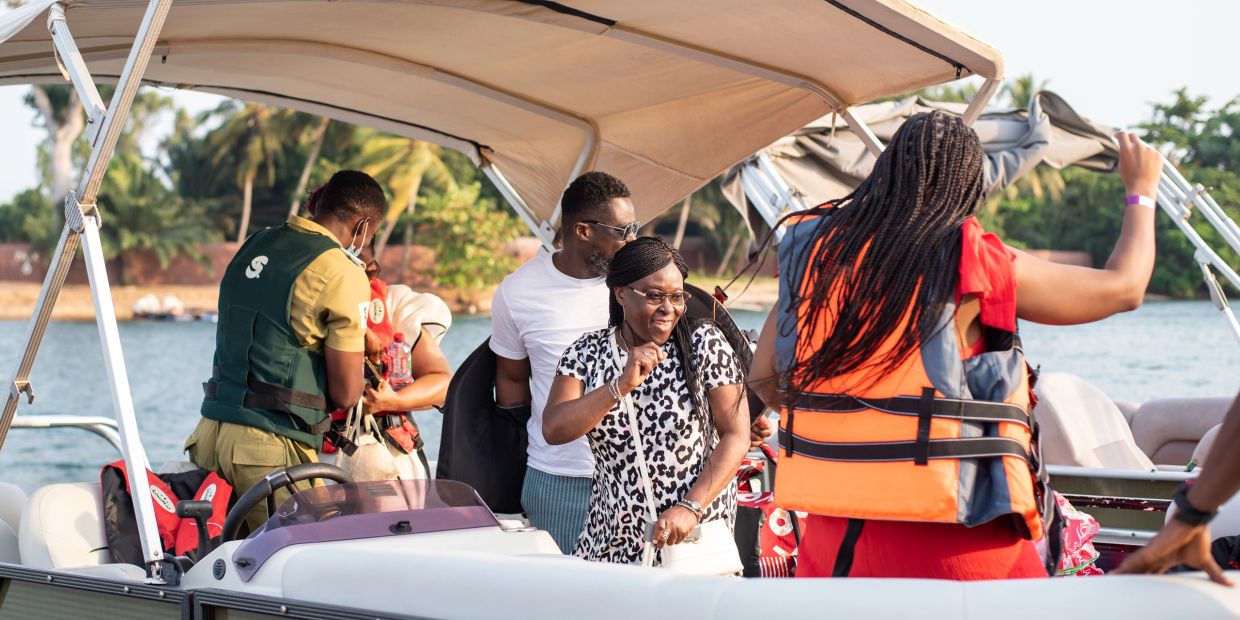 People enjoying a boat ride on a sunny day.