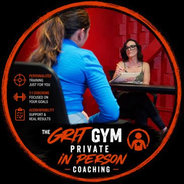 Two women engaged in a private coaching session at The Grit Gym.