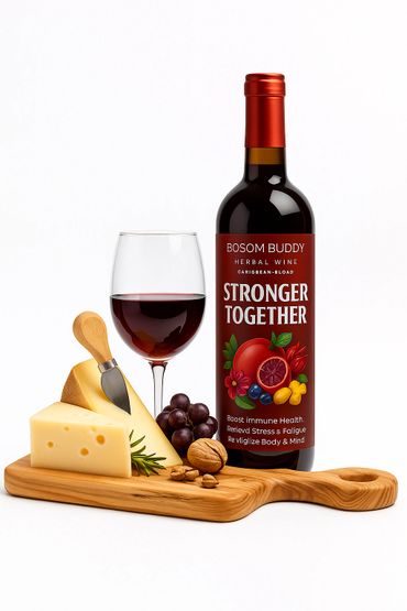 Bottle of Bosom Buddy herbal wine with cheese and grapes on wooden board.