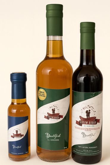 Three bottles of amber-colored liquid with green and blue labels.