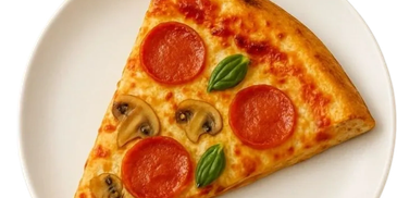 A slice of pepperoni and mushroom pizza with basil leaves on a white plate.