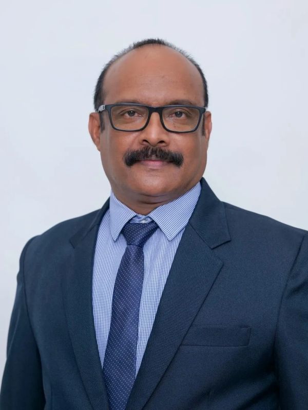 Professional man in a suit and glasses.