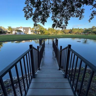 Pond Dock install with custom Dekorators Aluminum railing.