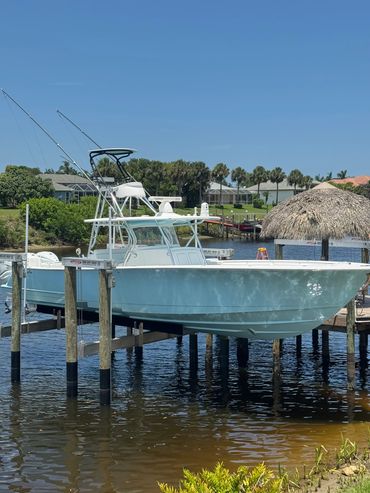 Blue Valhalla on Hurricane boat lift — America Strong Construction