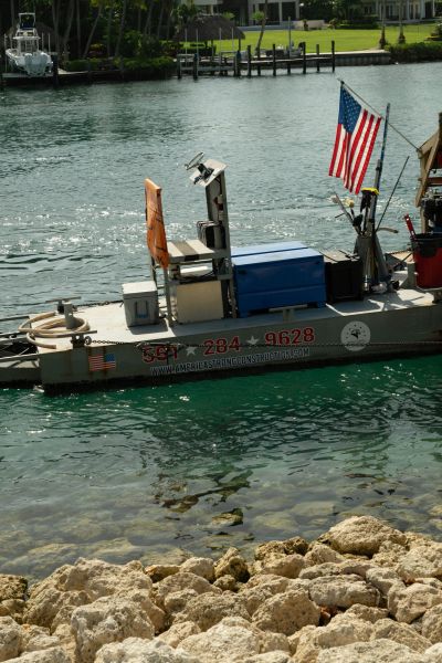 America Strong Construction marine work boat on Jupiter waterfront