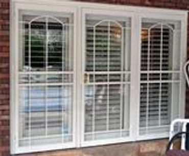 Photo of Triple Security Storm Door.