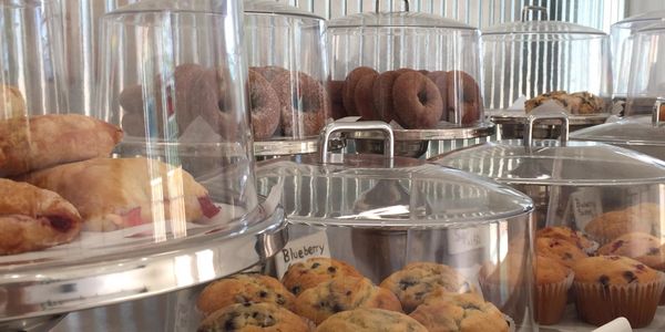 Muffins, croissant, donuts, cinnamon roll scones and more baked fresh. Add coffee or espresso drinks