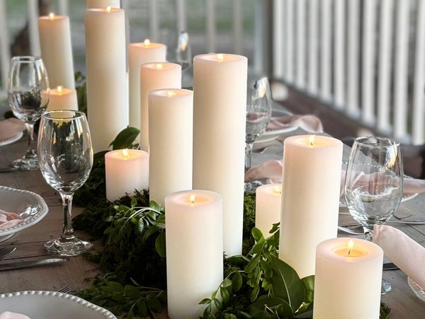 Bulk and wholesale pillar candles on table
