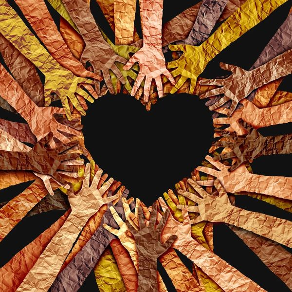 Image of hands reaching for each other.