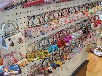 Tiny purses are back in stock. Large selection adn super nice quality. They are $6.50. Selling fast 