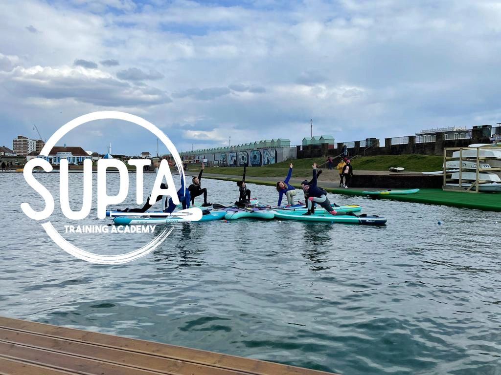 SUP Yoga class and SUPTA Logo