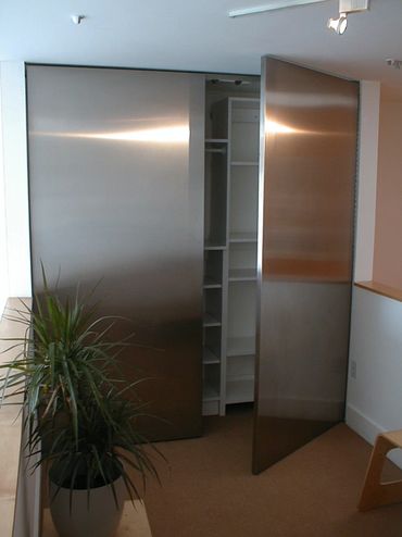 Residential Custom Closet Doors.
Stainless Steel Fabrication, Extra Storage, Touchless Opening, Clea