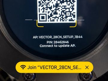 Phone scanning the VECTOR 28CN QR code to join the device’s setup Wi-Fi network.
