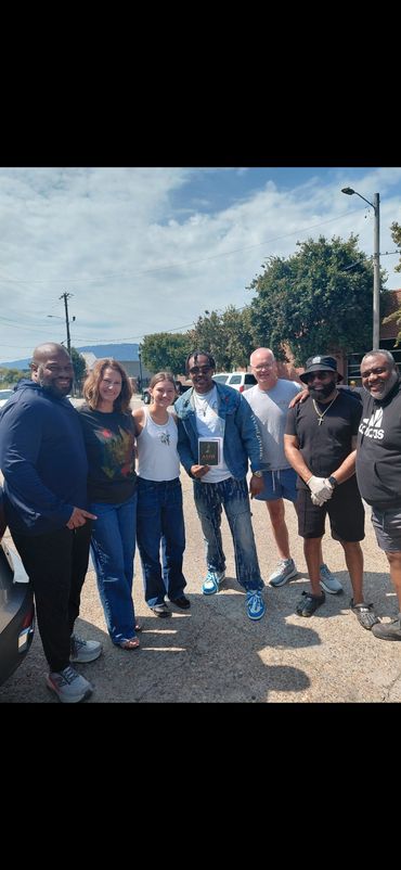 Ashe Core members Troy Rogers and LeBron Clay with other community organizers feeding our homeless.