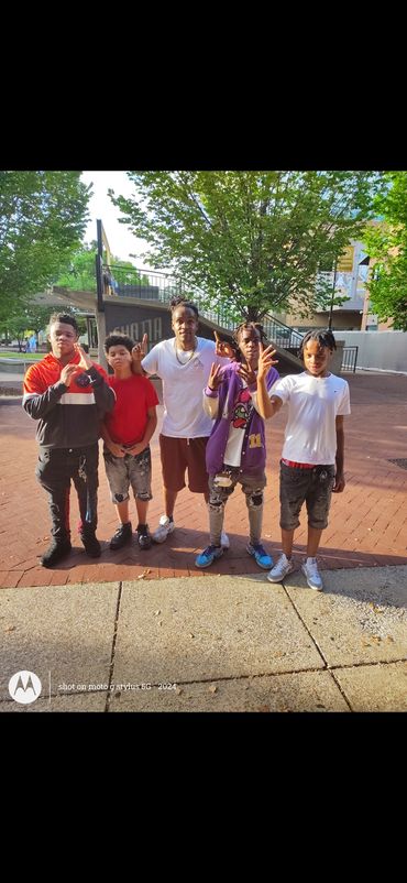 Ashe Core Empowerment Founder LeBron out mentoring a group of Ashe Core Youths.