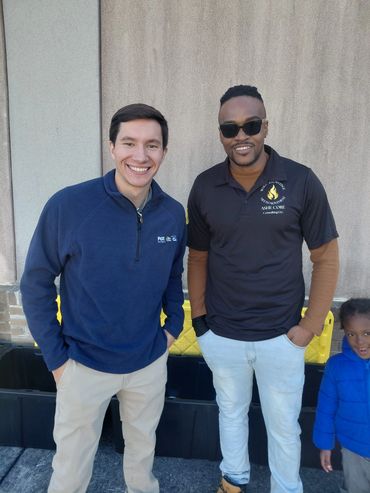 WTVC Fox News9 anchor Alexander Gajovich-Protich and Lebron Clay photed at Ashe Core give back event