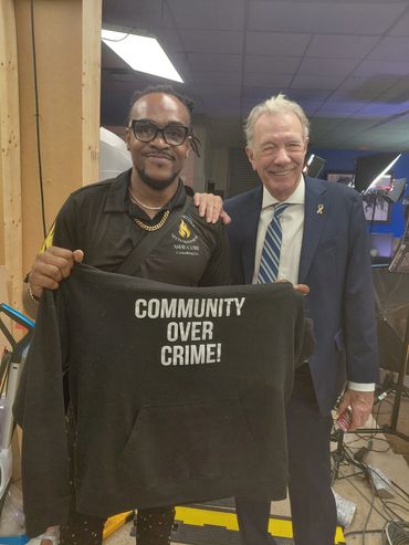 Ashe Core Youth Empowerment Founder LeBron Clay with Mr. Lamar Bearden on set to broadcast live.