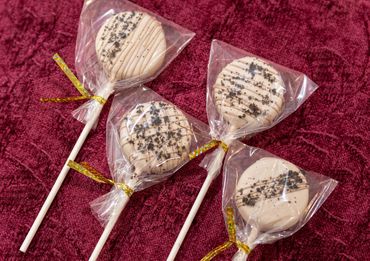 Four individually wrapped cake pops.