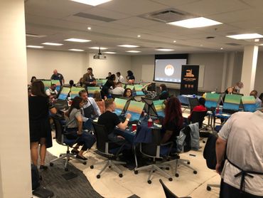 Royal Bank group participating in a Paint Party in their office