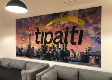 Collaborative mural team-building project for 45 people of a custom image of the Toronto skyline