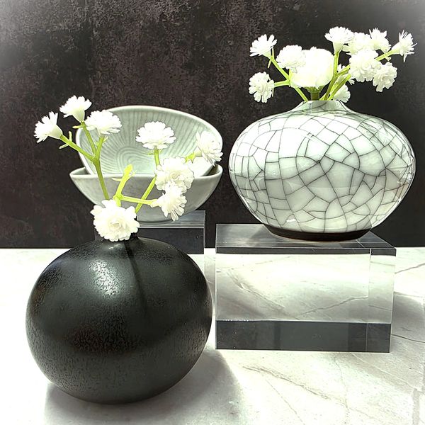 Selling art, antiques and collectables in Manchester. These are small vintage bud vases.