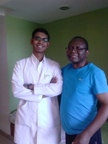 Founder with an overseas patient during an international physiotherapy session