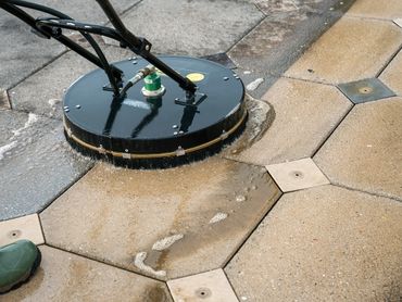 Pressure washing a driveway