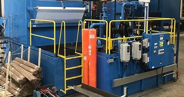 oberln automated pressure filter in a manufacturing shop