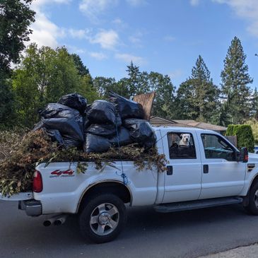 Yard debris and garbage in work truck