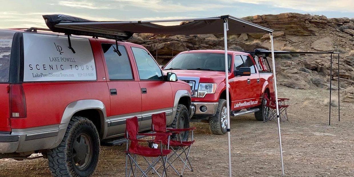 Lake Powell Scenic Tour's two tour vehicles used for private tours to The Wave, Arizona